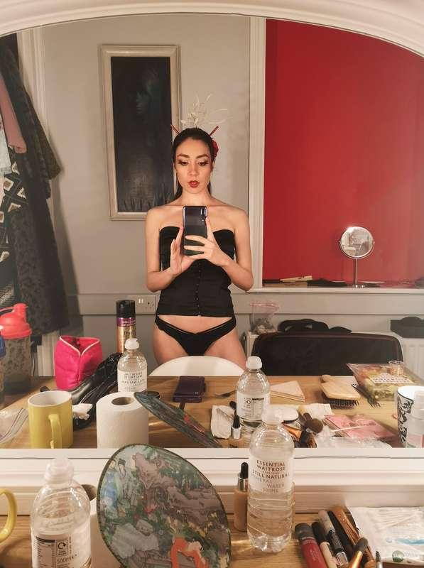 In some of my undergarments, mid outfit change
