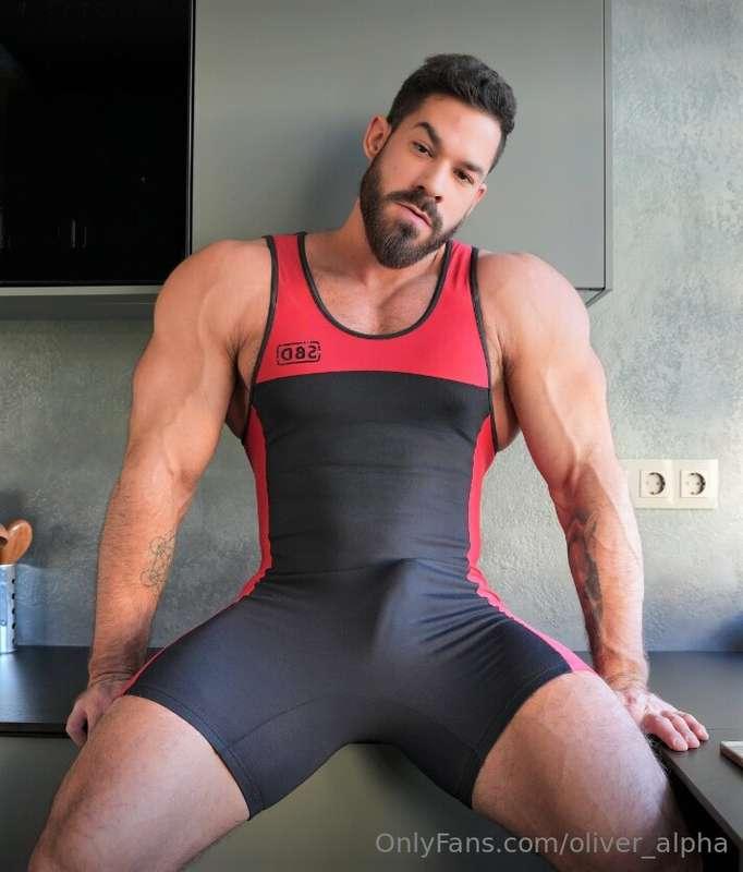 Suit’s tight, but something else is fighting for attention… ..