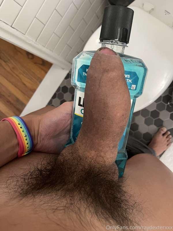 Making full-sized bottles of Listerine look like mini bottle..