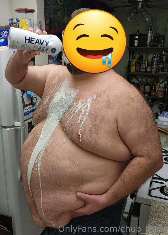 Getting messy guzzling cream!