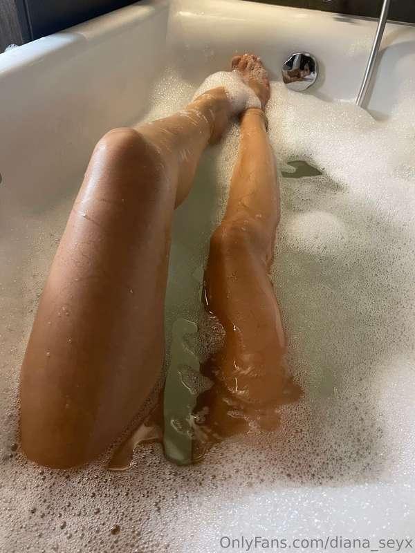 Relax for every girl, a warm bath, white foam, fragrant cand..