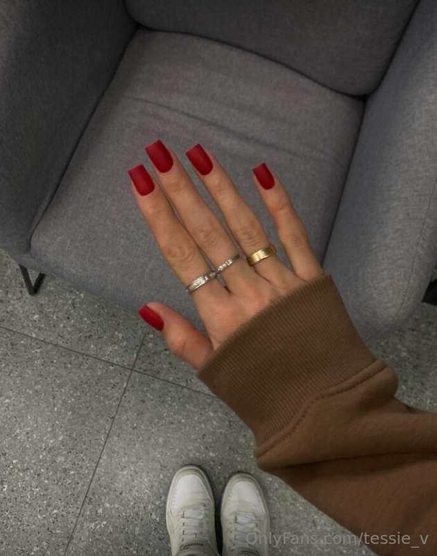 Dipped in the passionate hues of red, my fingertips tell a t..