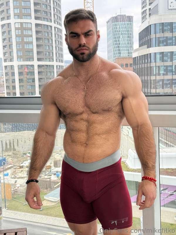 City view behind me, abs on display, and this hard cock pres..