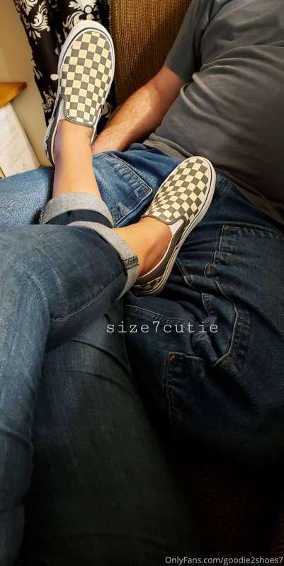 The Mister and I relaxing on the couch. My feet find the mos..