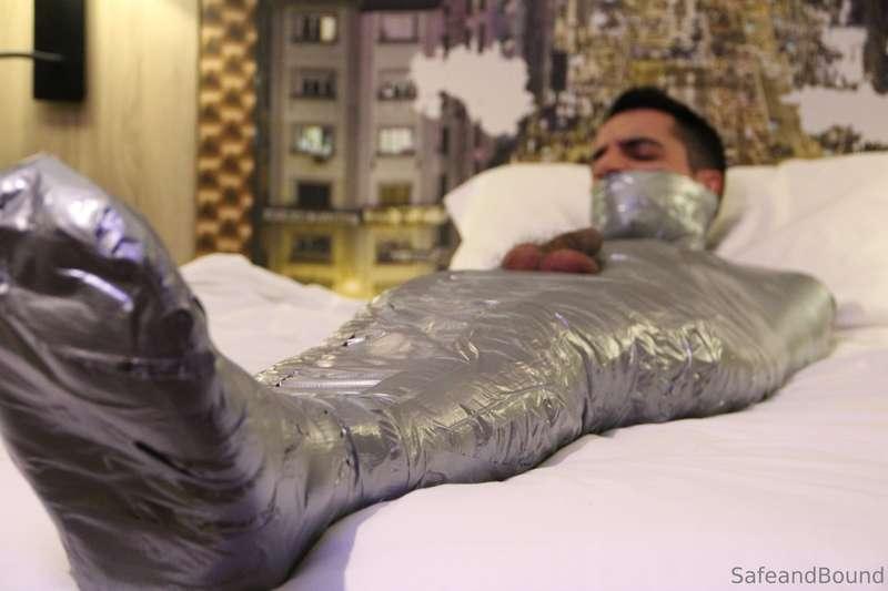 After a while struggling hogtied on the bed, I finally got m..