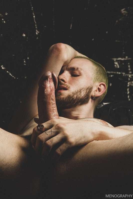 Tyler plays with his cut cock