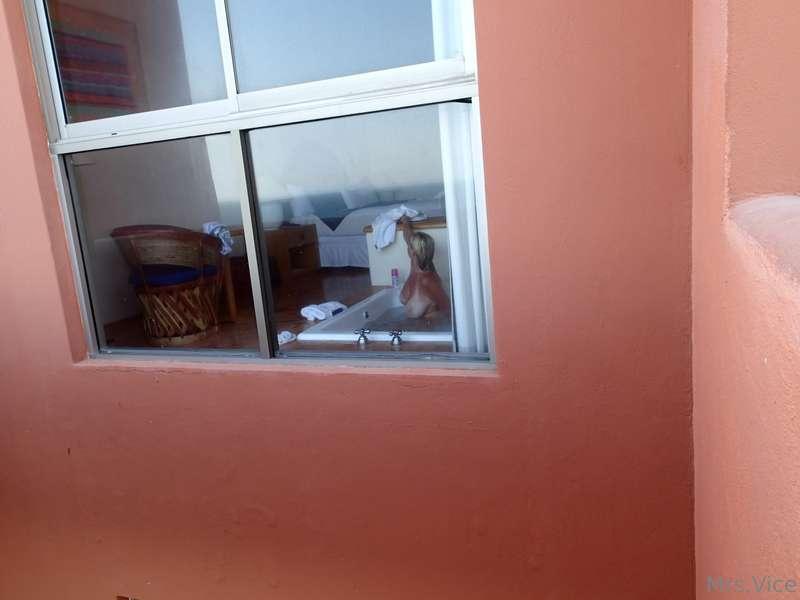For your TBT… hubby peeking in the window at me taking a bat..