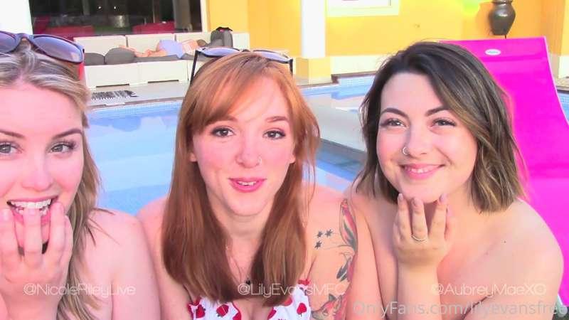 A blonde, a brunette, and a redhead are sitting by the pool...