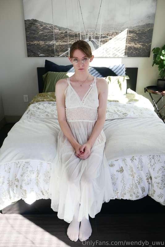 In virginal whites.