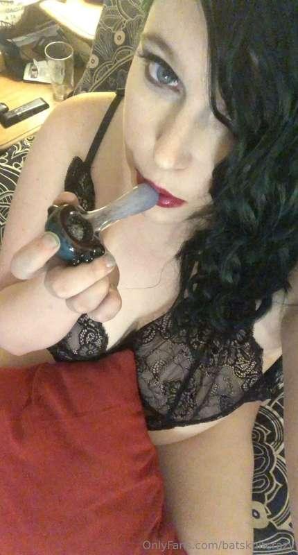 A smokin hot girl doing what she does