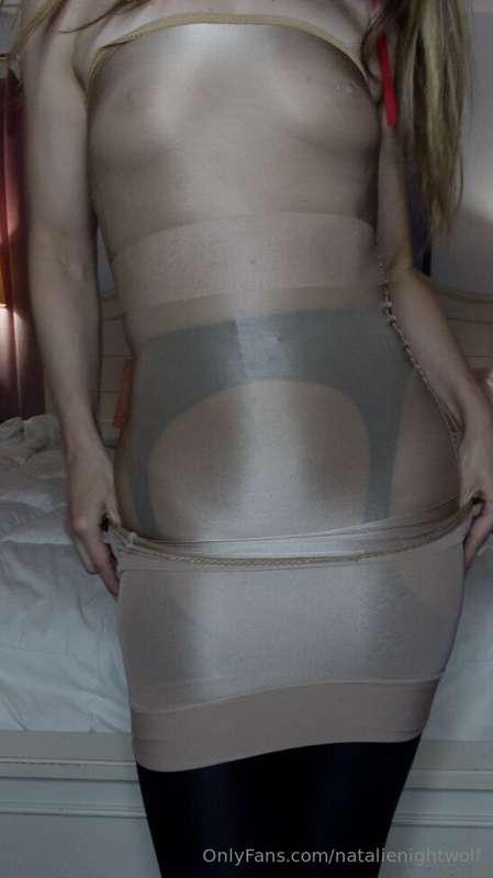 Wearing crotchless spandex pantyhose, a nylon dress, and a n..
