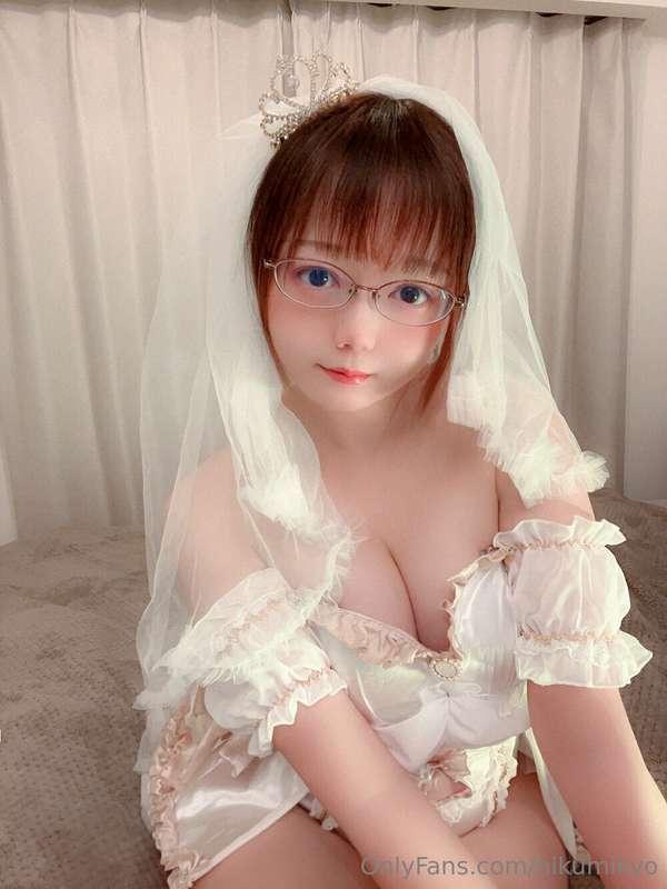 👰