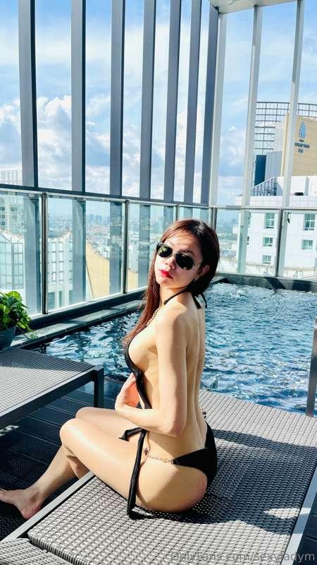 Let my sexy body enjoying the sun bath at the hotel pool, st..