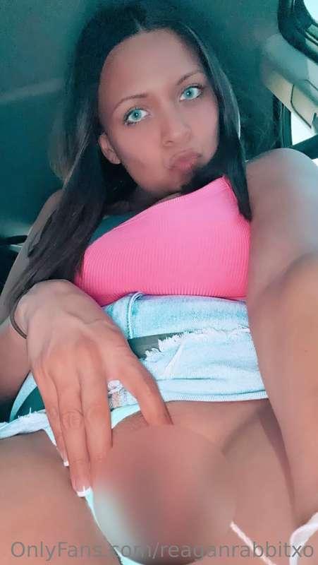 enjoy these two pics of me playing w/ my kitty in the car ea..
