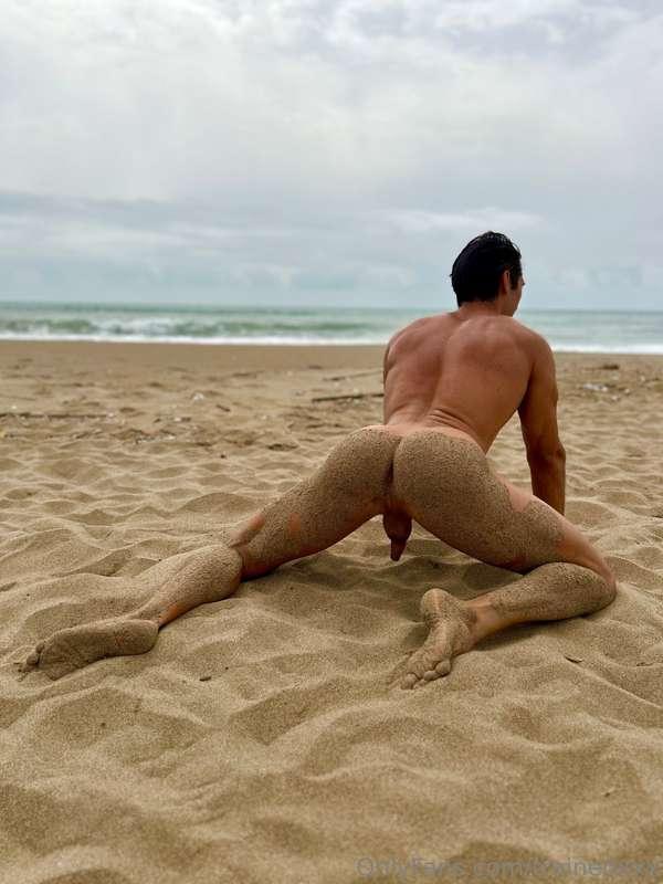 Rolling arround in the sand at the beach. My body it's fully..