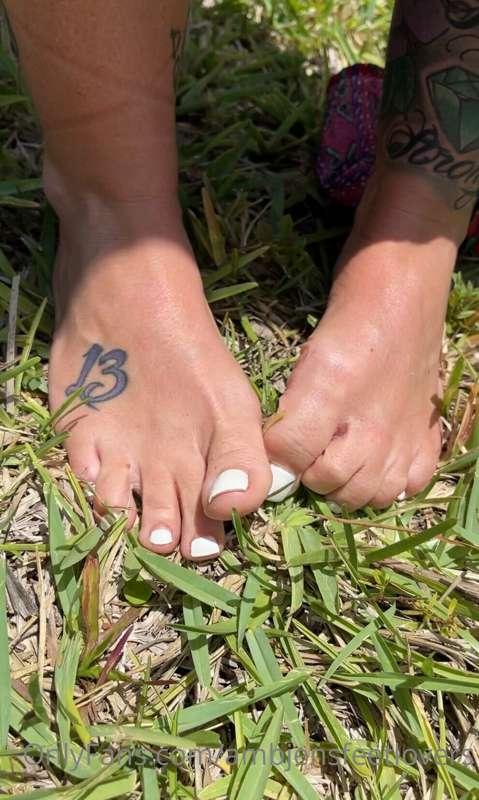 Squishing my feets in the grass..