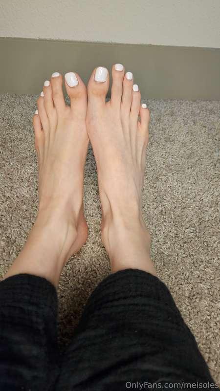 long feet and toes with my perfect new pedi ready to drain 