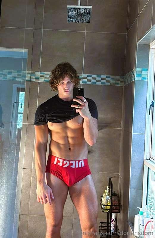 Shirt lifted, abs tight, cock thick and hard in my brief… yo..