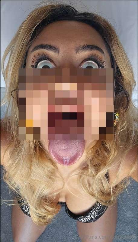 My mouth’s wide open, with my tongue hanging out like I’m cr..