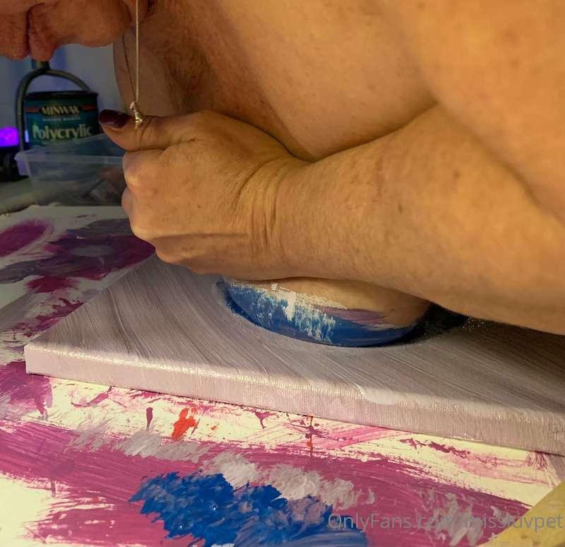 Body painting transferred to canvas.