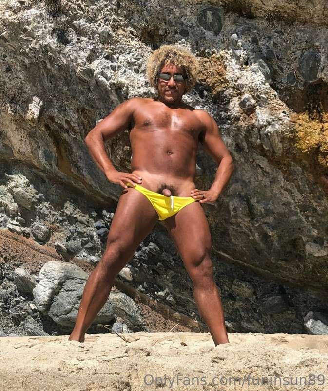 Stripping out of swimsuit.  Nudity is more fun anyway!