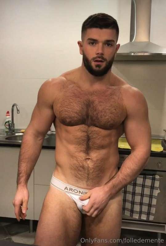I show off my hairy body in a jockstrap, jerk off and cum wa..