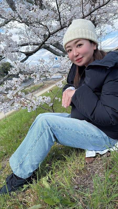 Just sitting under the cherry blossoms, feeling soft and hap..