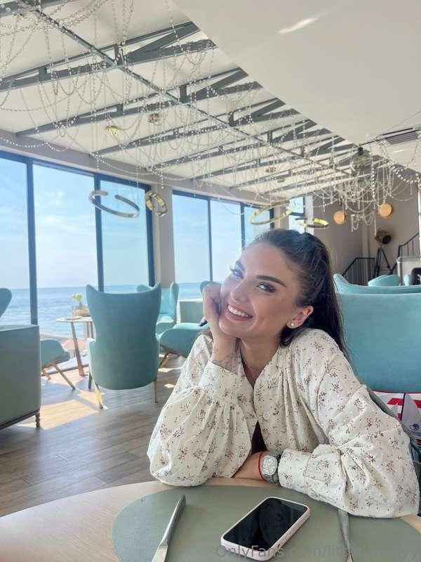 You walk into a quiet café by the sea and see me sitting by ..