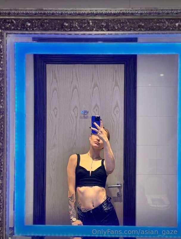 As I stood before the mirror, draped in elegance, a vision e..