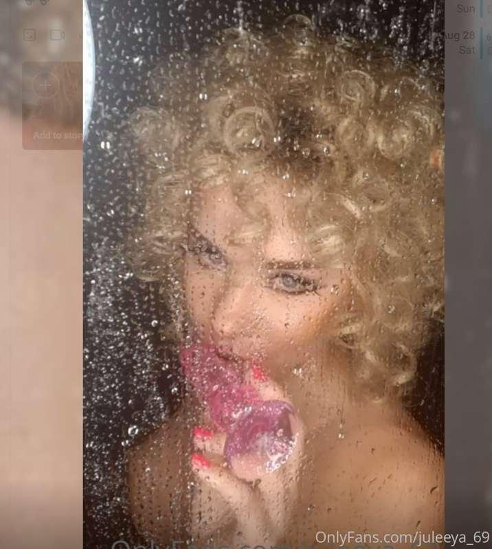 I wash in the shower and fuck my pussy with a pink transpare..