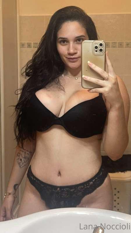 A woman in a sexy black lingerie, it’s nothing less than GOD..