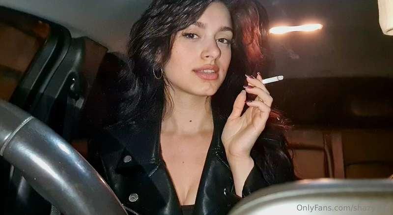 Smoking in my car a Marlboro red, wearing a leather jacket ❤..