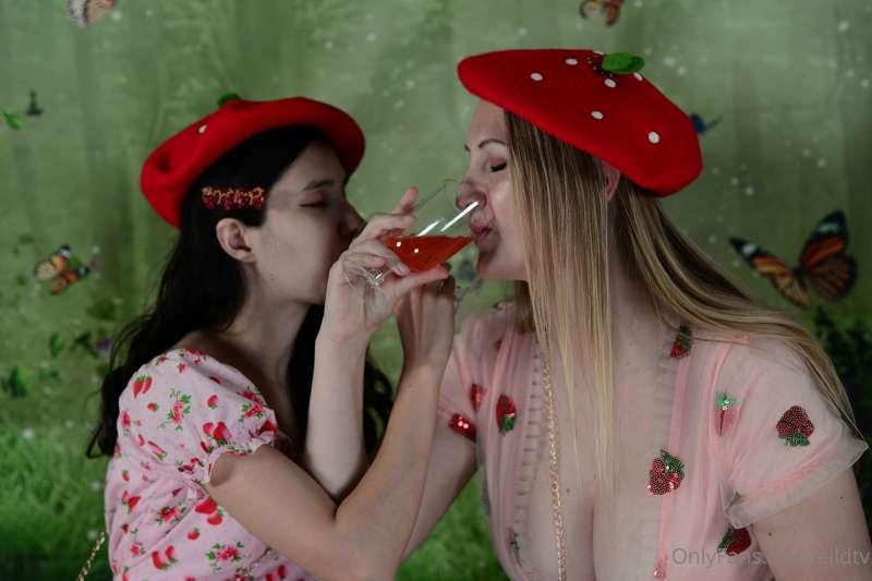 Just two strababies enjoying some strawberries in an indoor ..