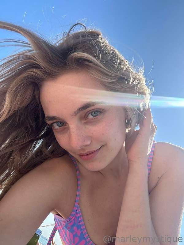 Embracing the warmth of summer, where the sun-kissed waves a..