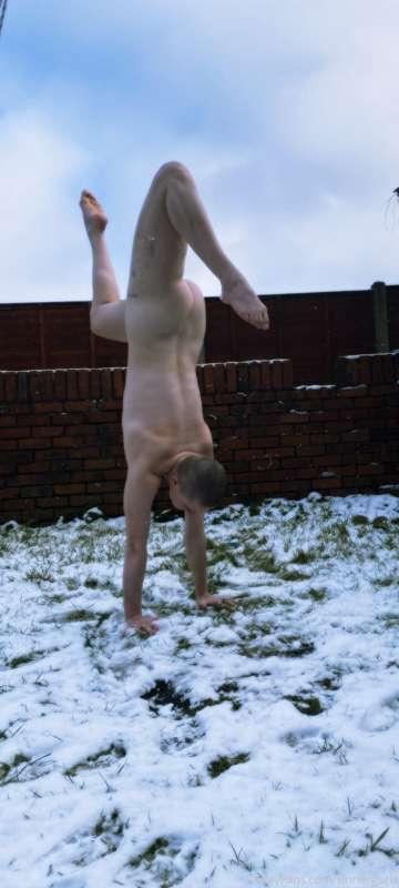 naked snow handstands