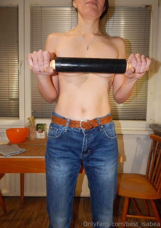 Try to guess what delicious I will bake. Topless in jeans, c..