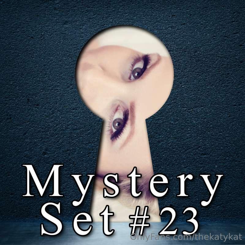 Ooooh.  Mystery Photo Set #23 These Mystery Sets will always..