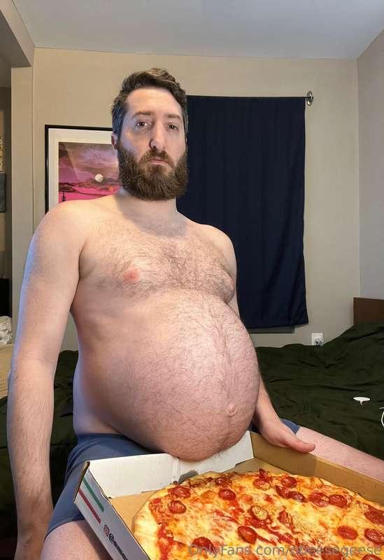 Eating pizza, drinking soda, and lots of burps.