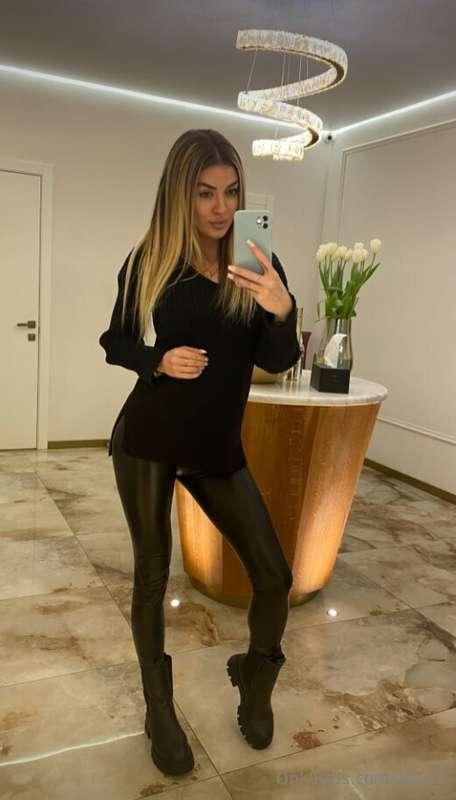 In the looking glass, I behold a vision of sheer elegance, a..