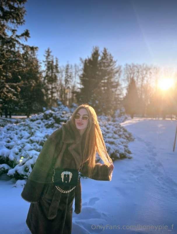 Dancing in the snow, basking in the warmth of winter sun ray..