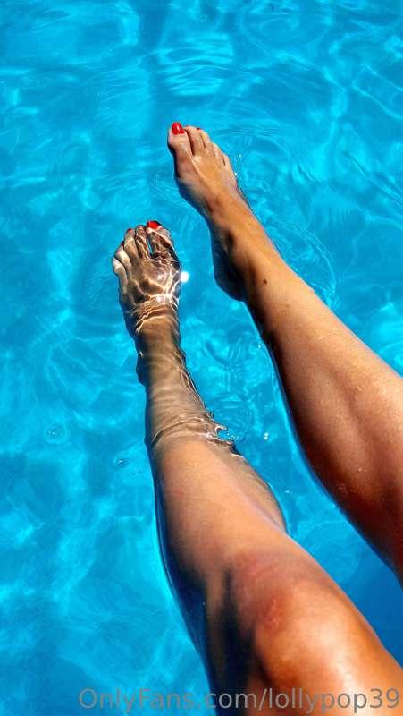 A nice day at the pool waiting for someone to get in the wat..