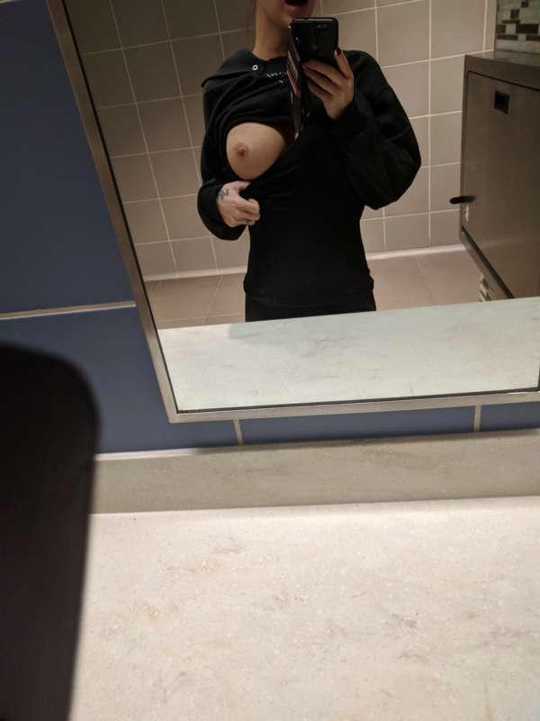 Airport boob flash. 