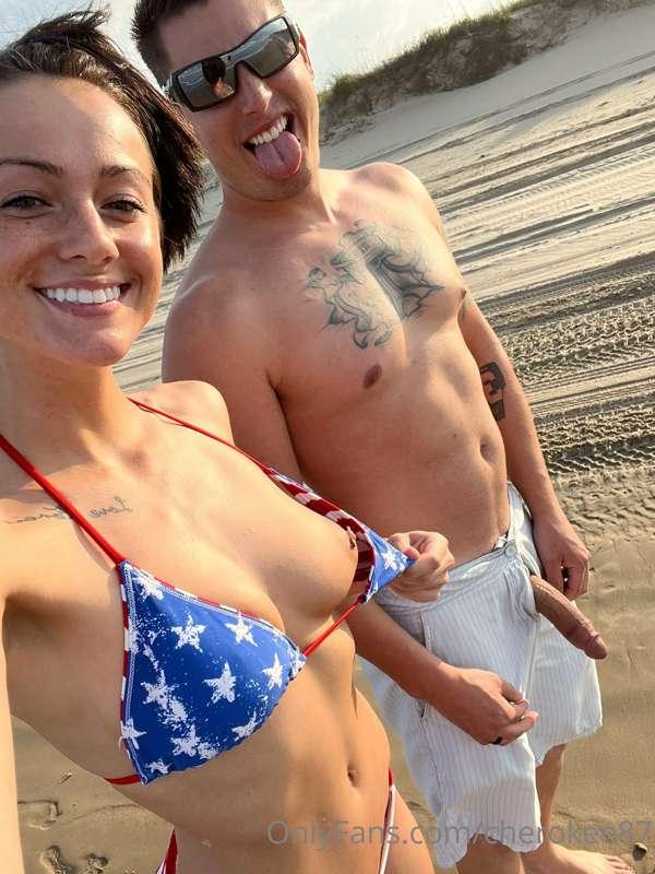 Just a beautiful couple taking pics and video on the beach!!..