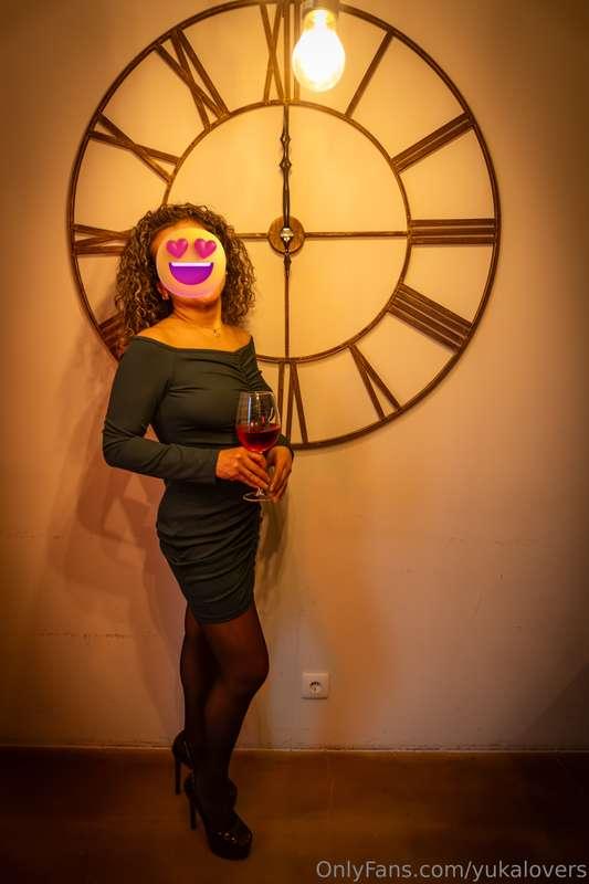 With my tight green dress👗,black stockings and my high heels..