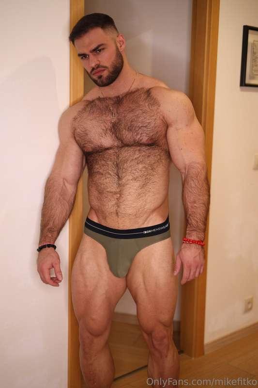 Standing at the doorway, half naked with this hard cock stra..