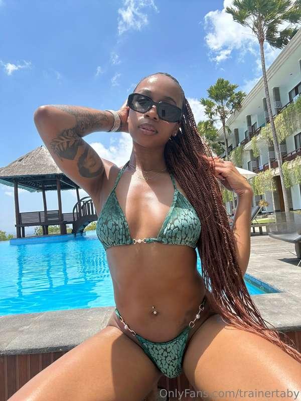 Chilling by the pool, living the good life. ☀️🍹