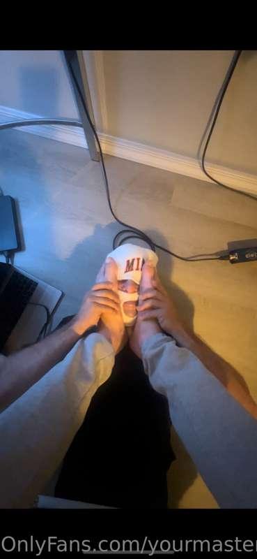 Slave serves my Alpha Feet as I work! A low life foot rest!