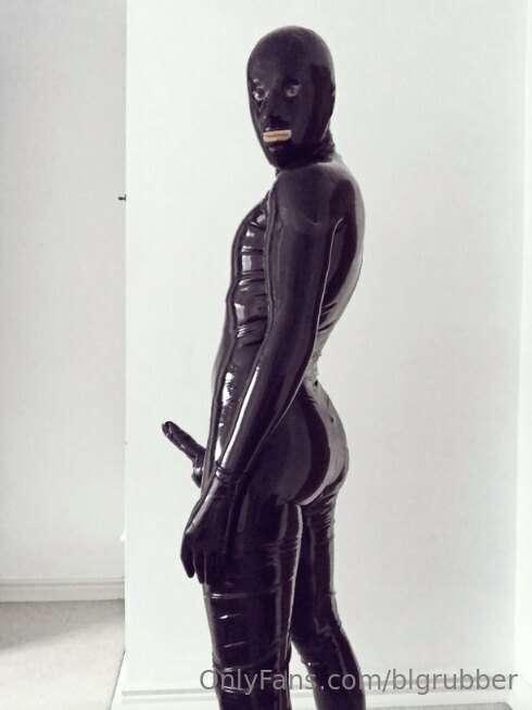 A gimp...no wait a Dom Gimp with a hard rubber cock!