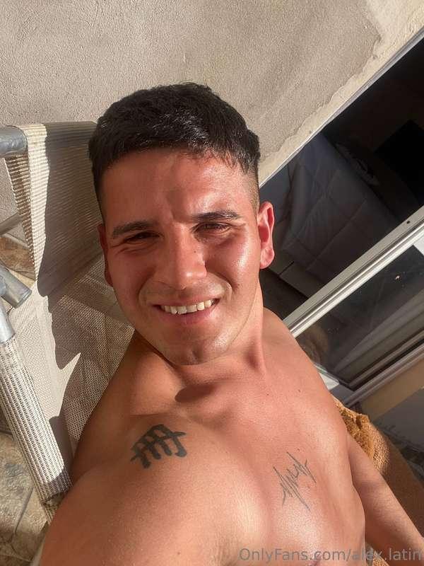 On my balcony very hot showing my tanned cock. Do you want u..