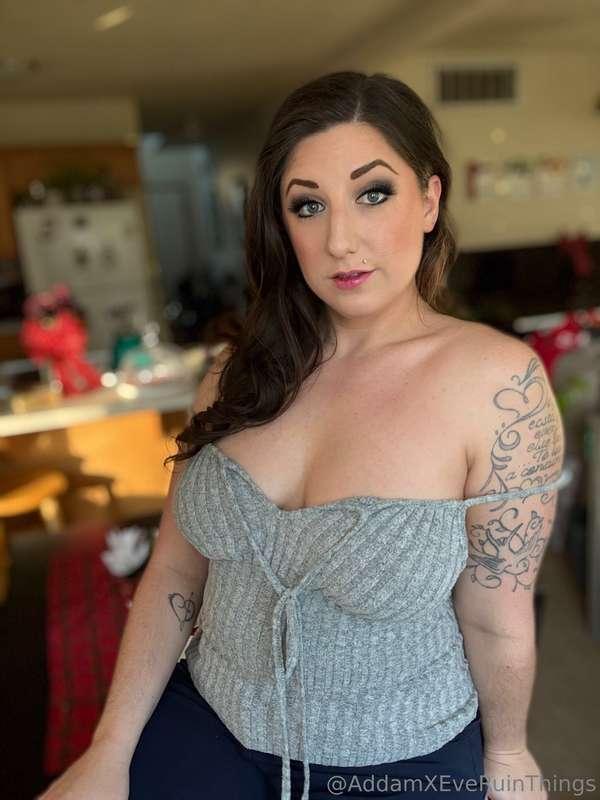 Look! If you pull these strings this tank top falls right of..
